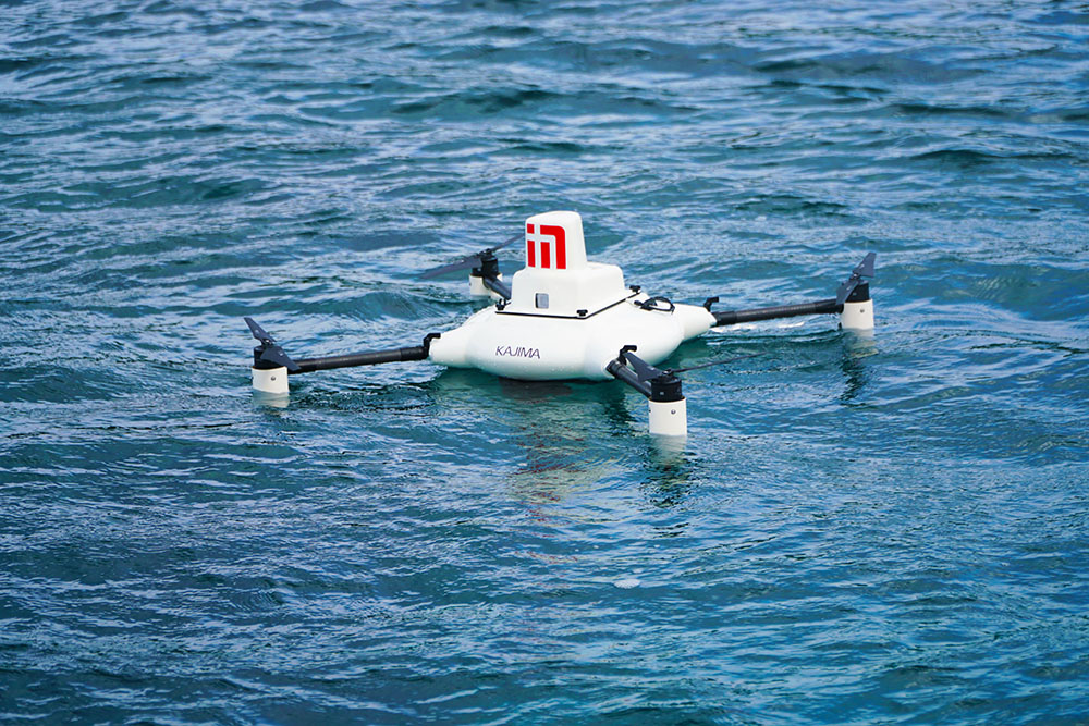 Coral monitoring by water surface landing drone